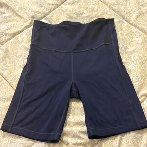 Athleta ultimate stash pocket 7” short
 Navy Blue Shorts